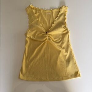 Yellow Old Navy tank top with ruffle detail and button front
